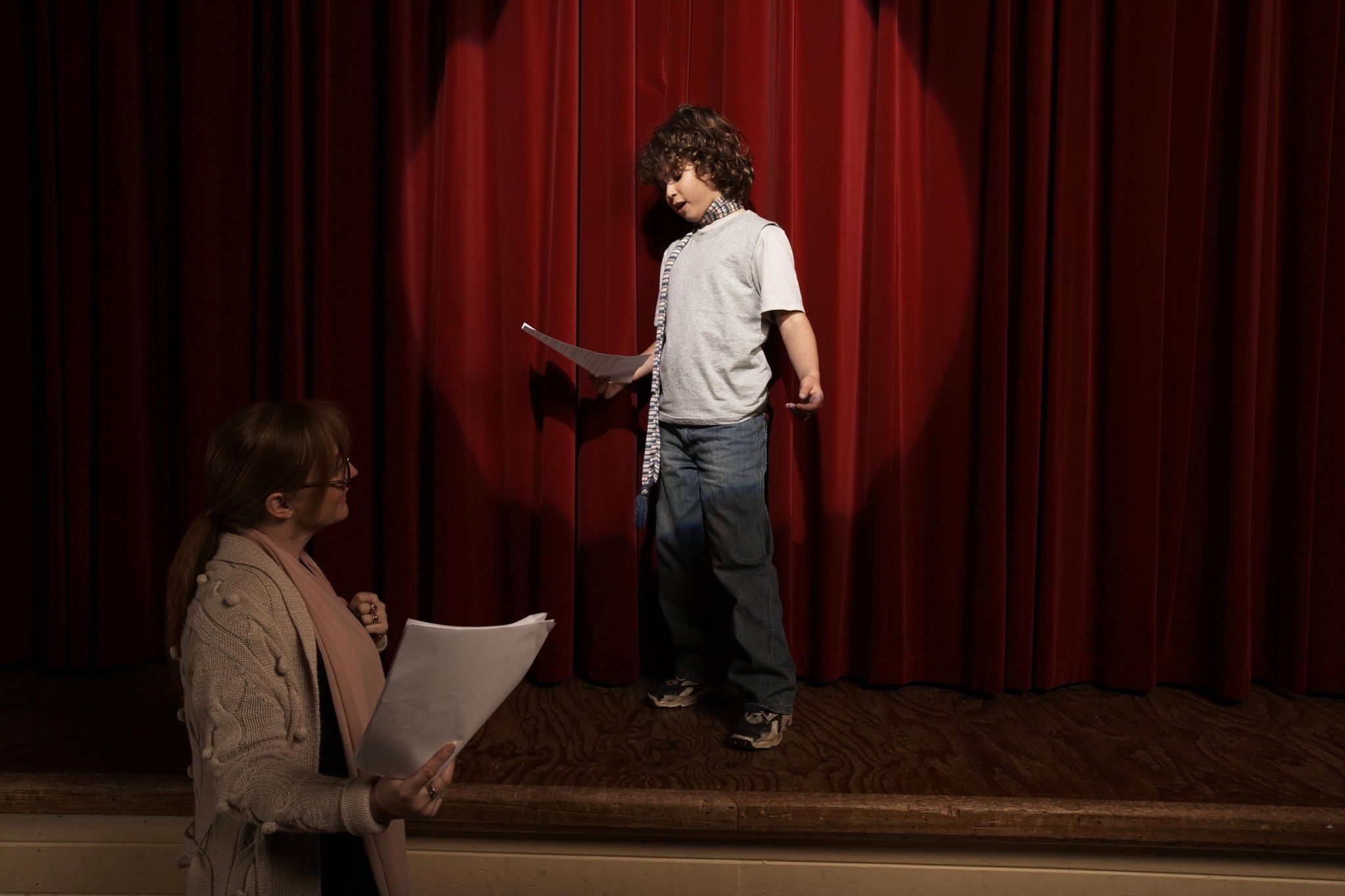 Child performing on stage