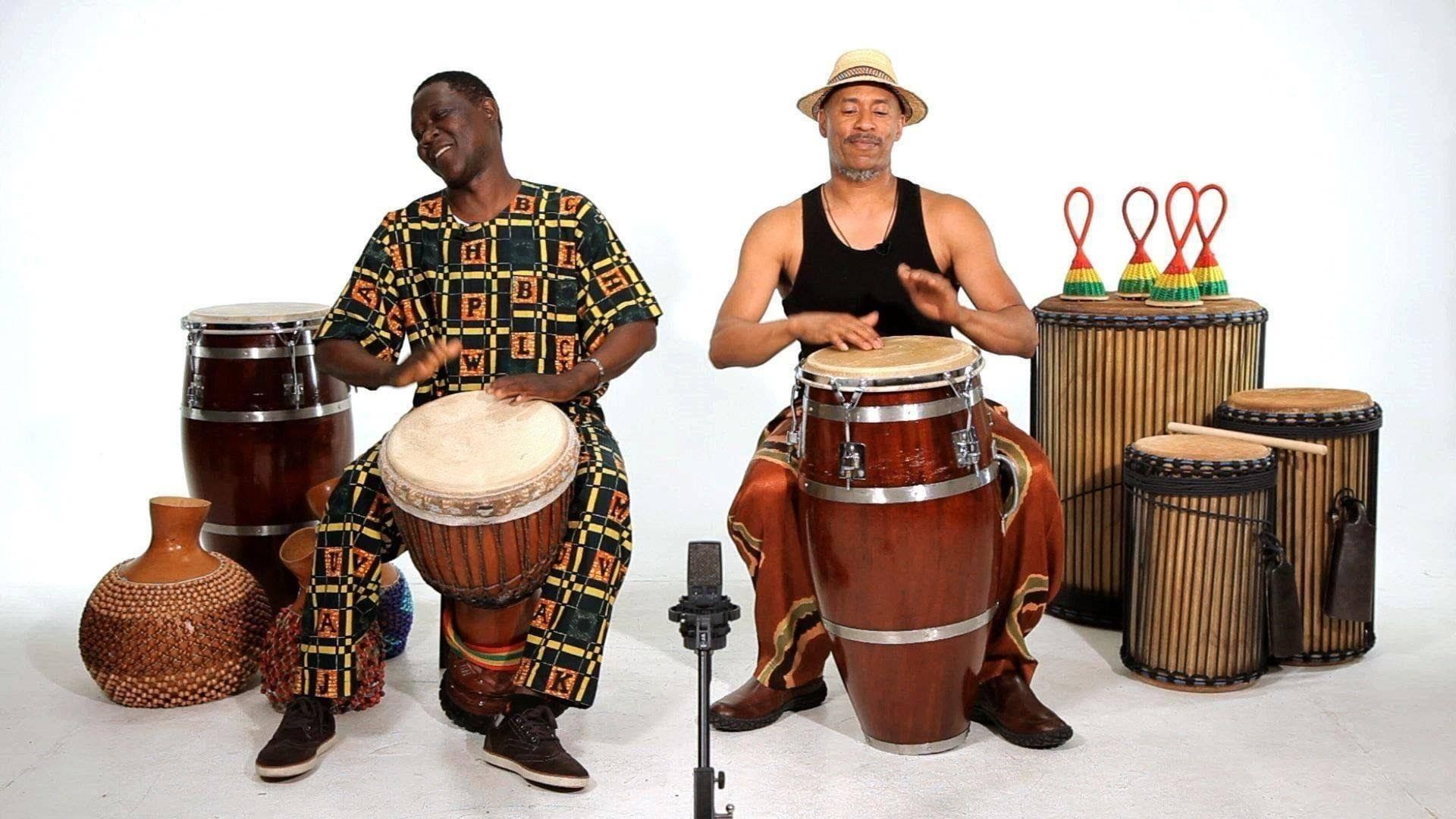 Песня поет мужчина там там. Музыкальный инструмент Африки джембе. Африка барабан джембе. Барабаны Конго Бонго. Бонго музыкальный инструмент Африка.