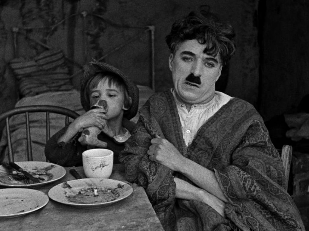 Кадр из художественного фильма Чарли Чаплина «Малыш» (1921) 